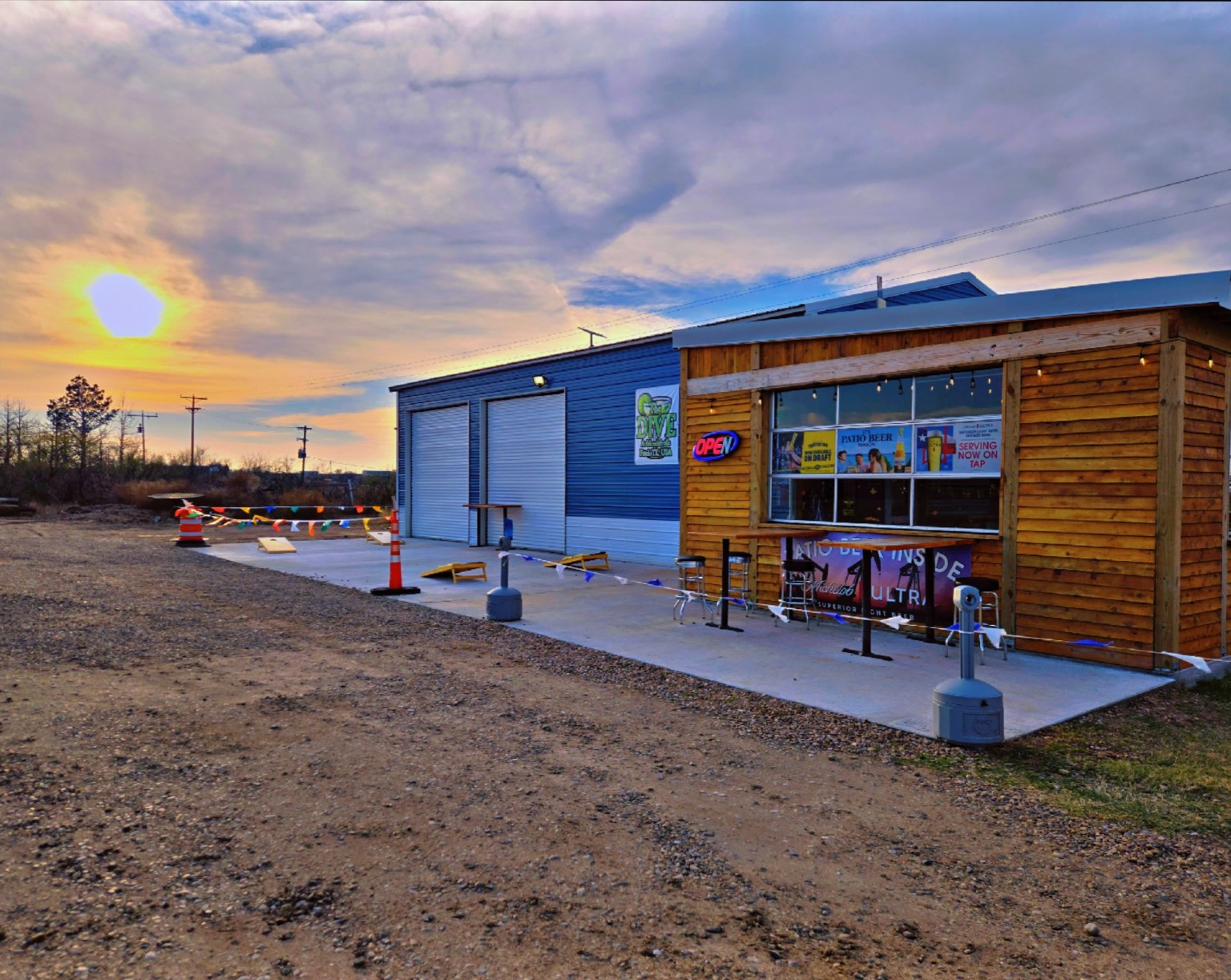 The Dive's patio at sunset, located within Camp Meredithville